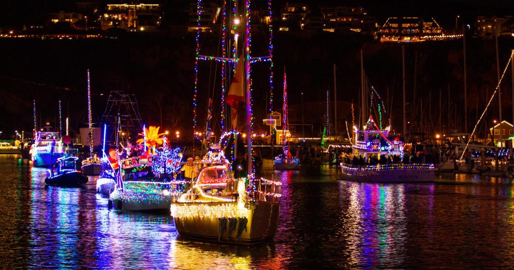 Decorated boats light up Dana Point Harbor during annual Boat Parade