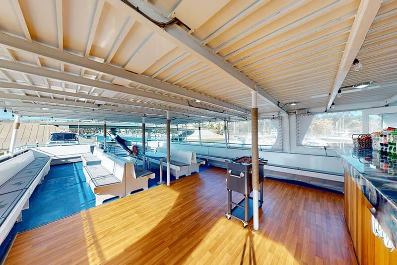 Dance floor on observation deck of Hoku Nai'a Whale Watching Power Catamaran off the coast of Dana Point, CA